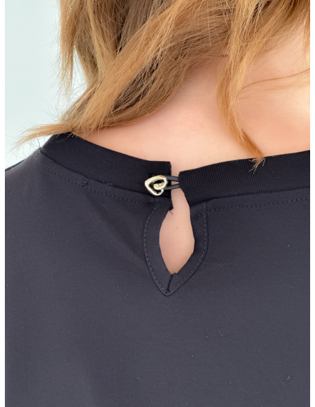 T-shirt with jeweled button