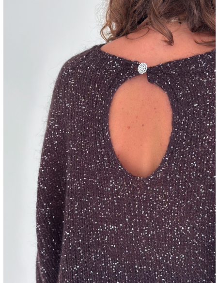 Cut-out sweater embellished with sequins and a jeweled button