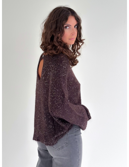Cut-out sweater embellished with sequins and a jeweled button