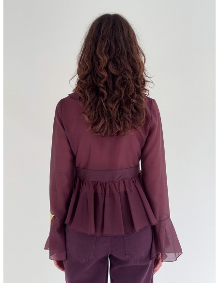 Shirt with ruffled details and calla-style sleeves