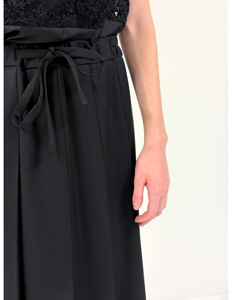 Pleated skirt with double length