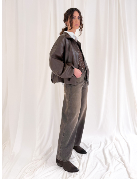 Openwork sweater with lurex thread and fringes