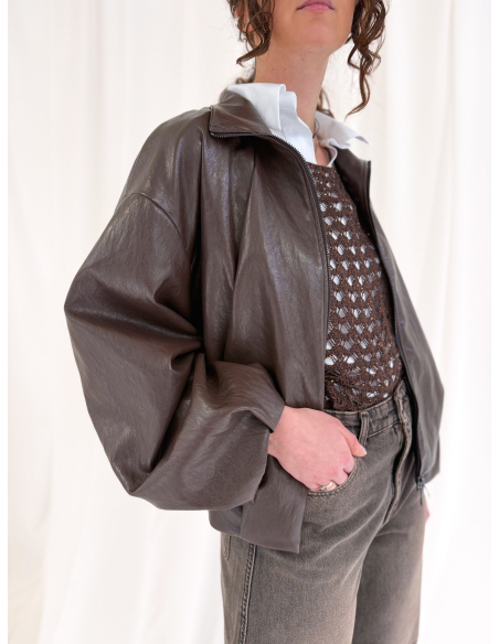 Openwork sweater with lurex thread and fringes