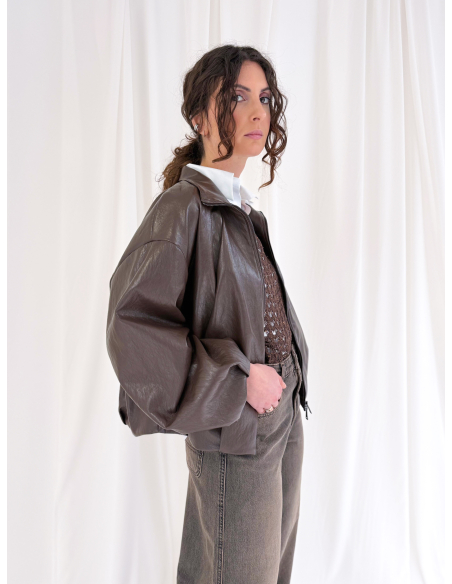 Openwork sweater with lurex thread and fringes