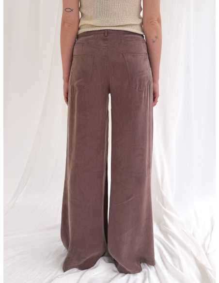 Fluid trousers with a washed effect