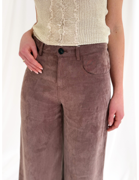 Fluid trousers with a washed effect