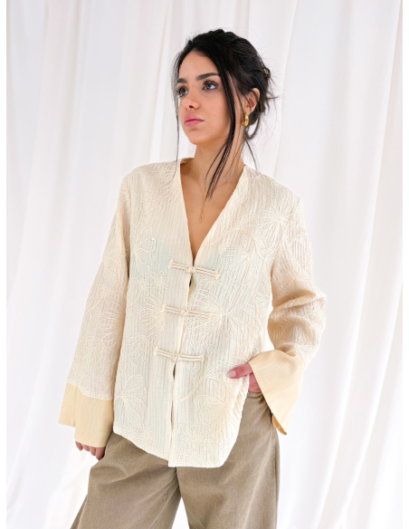 Jacket embroidered with frogs