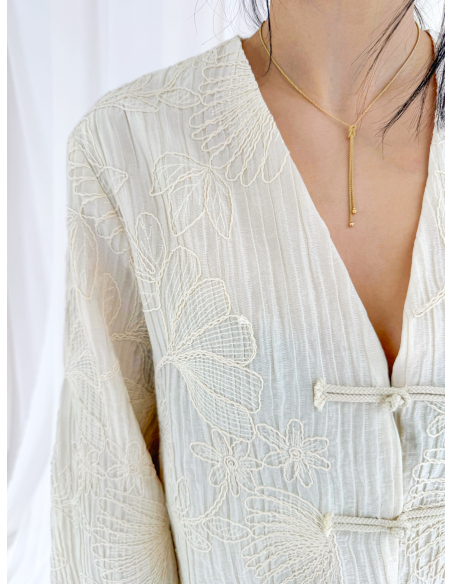 Jacket embroidered with frogs