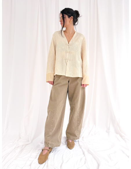 Jacket embroidered with frogs