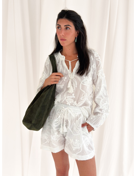 Blusa in cotone con ricami floreali