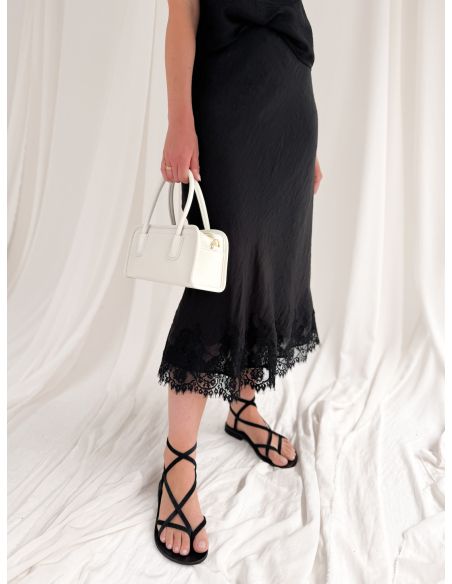 Longuette skirt with lace applications