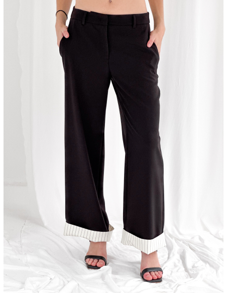 Pantalone sartoriale con risvolto a contrasto