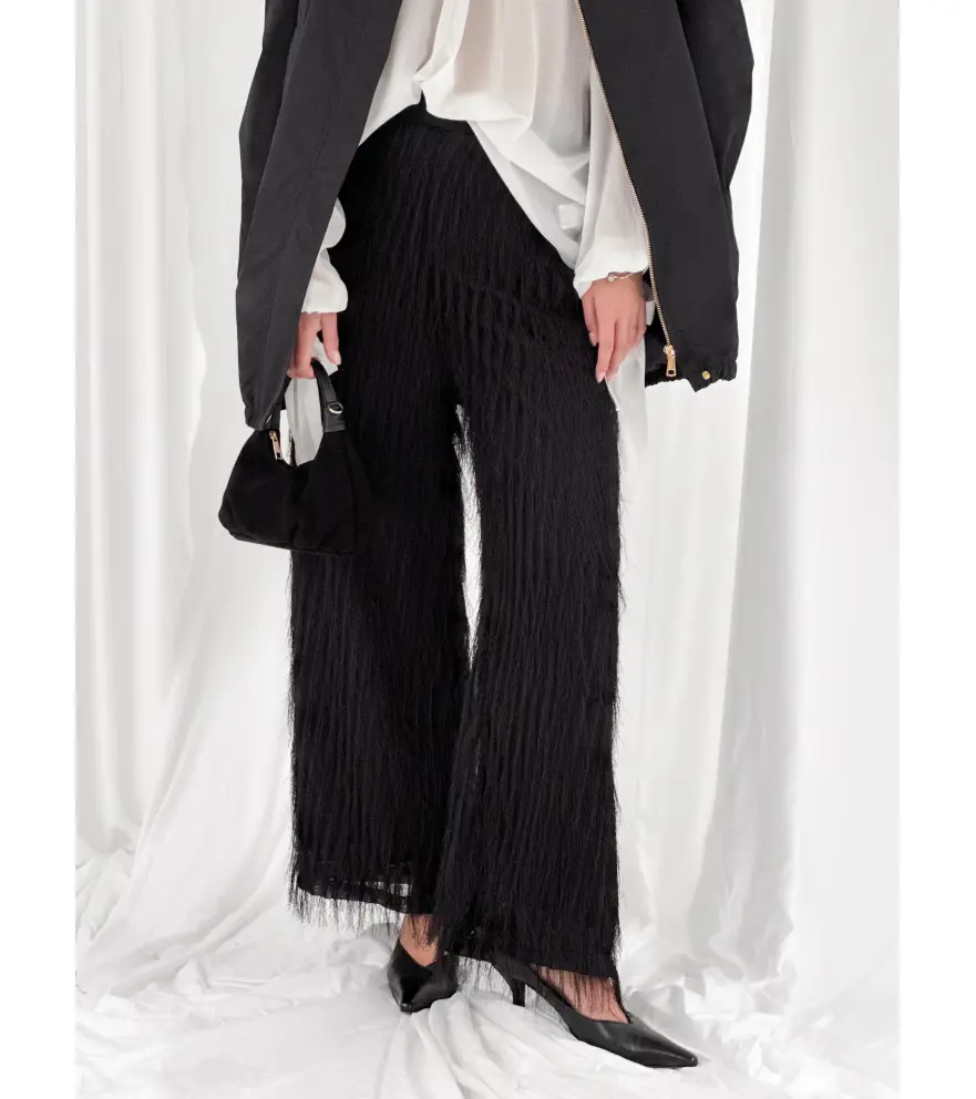 Fluid trousers with fringe